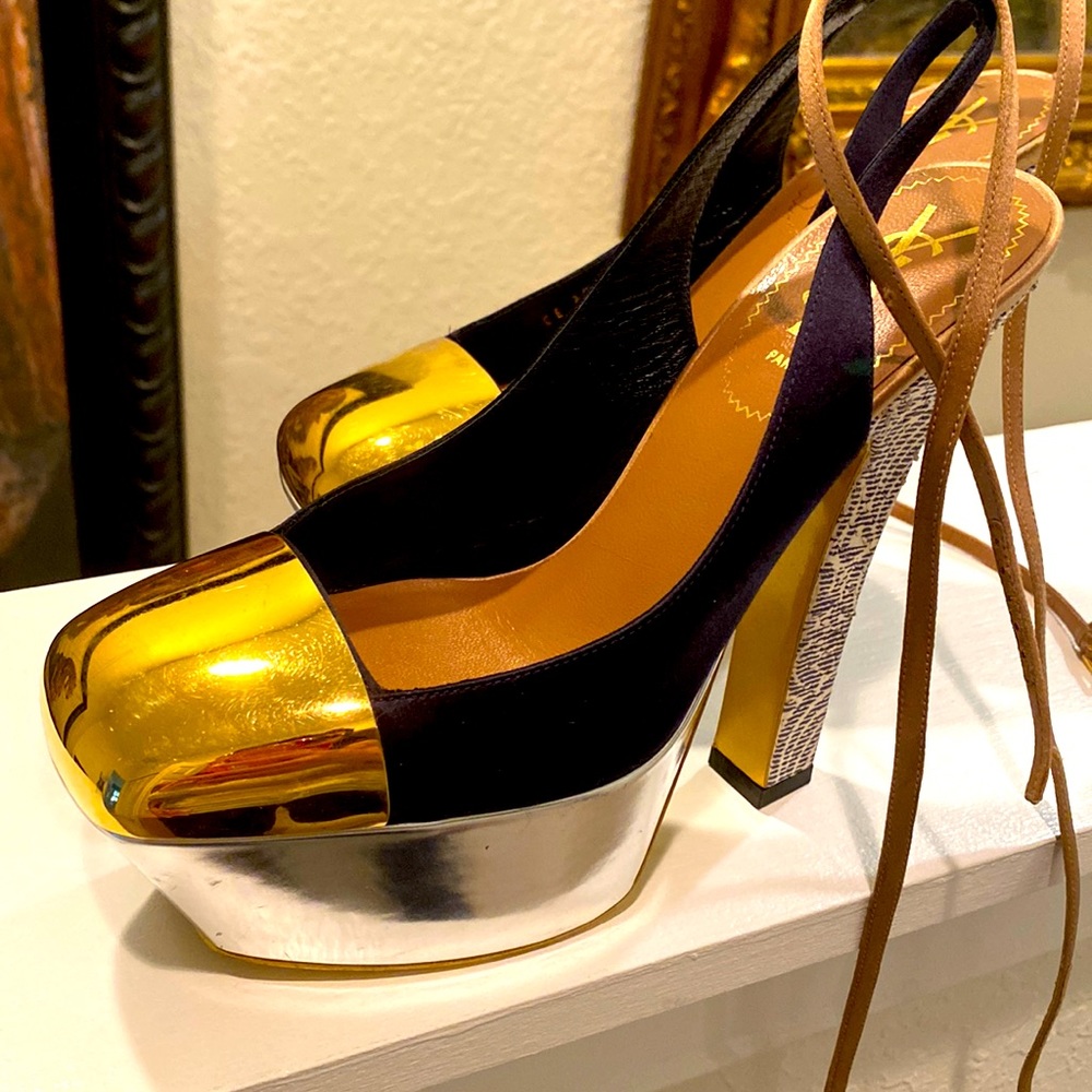 These are a pair of gorgeous pumps by YSL. These are used with no box.